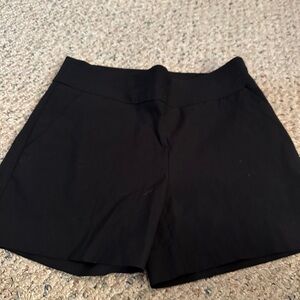 New York and company pull on black shorts